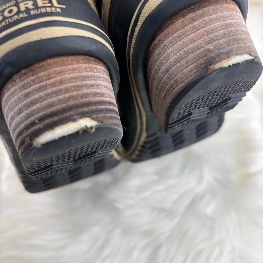Sorel Tan and Black Lace-Up Boots